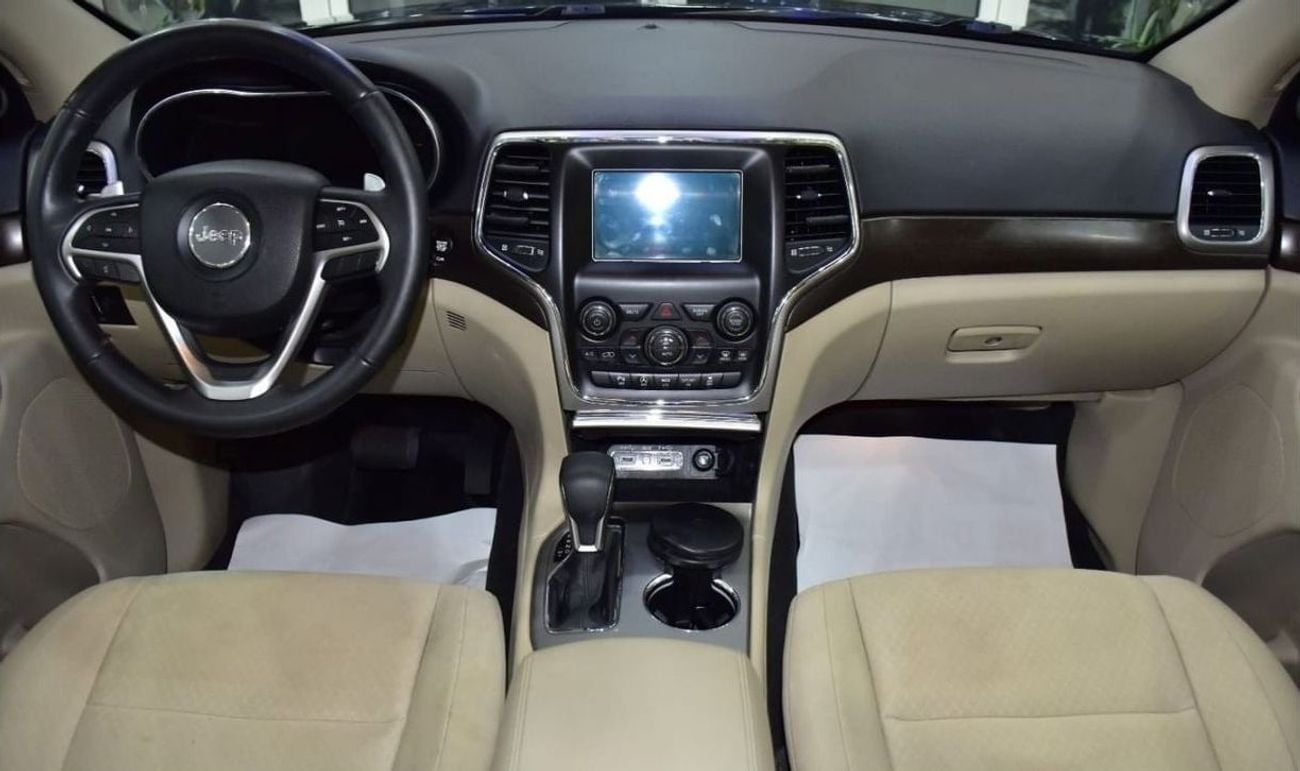 Jeep Grand Cherokee LAREDO EXCELLENT DEAL for our Jeep Grand Cherokee 4x4 (2018 Model) in Black Color GCC Specs