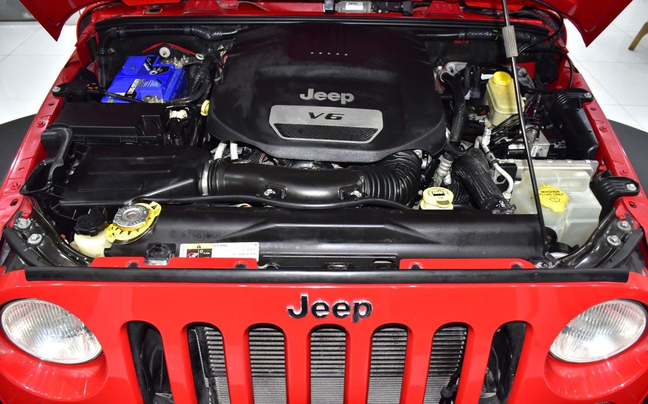 Jeep Wrangler SPORT EXCELLENT DEAL for our Jeep Wrangler Sport ( 2017 Model ) in Red Color GCC Specs