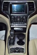 Jeep Grand Cherokee LAREDO EXCELLENT DEAL for our Jeep Grand Cherokee 4x4 (2018 Model) in Black Color GCC Specs