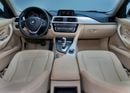 BMW 318i STANDARD 0% Down Payment Available • Full Service History • GCC