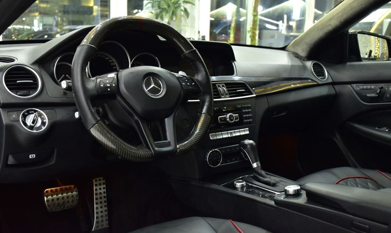 Mercedes Benz C63 AMG STANDARD EXCELLENT DEAL for our Mercedes Benz C63 AMG ( 2013 Model ) in Black Color GCC Specs