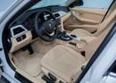 BMW 318i STANDARD 0% Down Payment Available • Full Service History • GCC