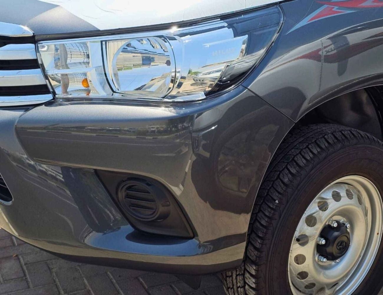 Toyota Hilux TOYOTA HILUX BASIC NARROW BODY || DOUBLE CABIN | 2.4L DIESEL A/T 4WD | PWR WINDOWS (CODE # HDA) GRAY