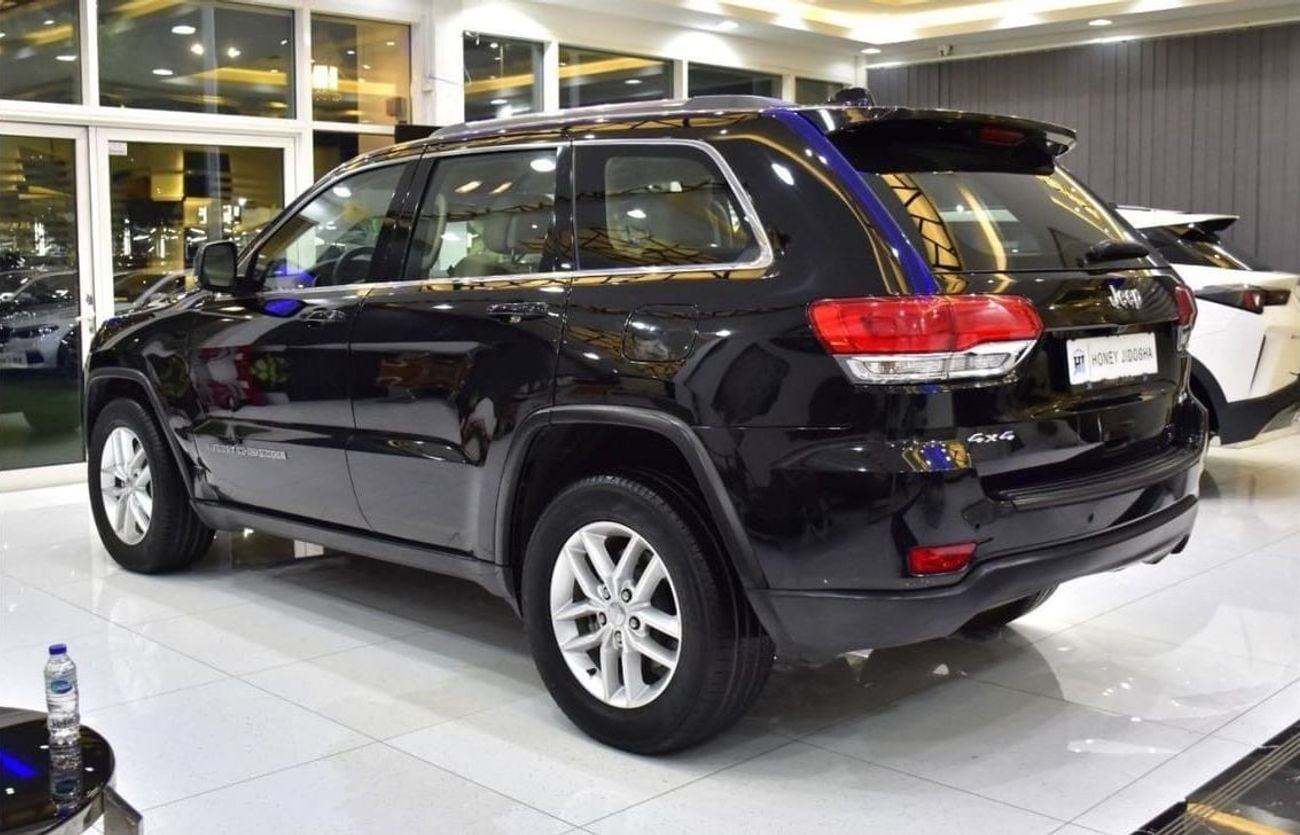 Jeep Grand Cherokee LAREDO EXCELLENT DEAL for our Jeep Grand Cherokee 4x4 (2018 Model) in Black Color GCC Specs