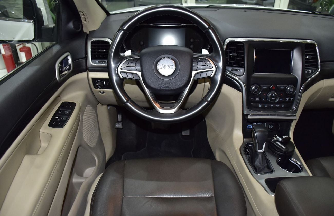 Jeep Grand Cherokee LAREDO EXCELLENT DEAL for our Jeep Grand Cherokee ( 2020 Model ) in White Color GCC Specs