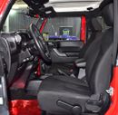 Jeep Wrangler SPORT EXCELLENT DEAL for our Jeep Wrangler Sport ( 2017 Model ) in Red Color GCC Specs