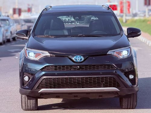 Toyota RAV4 XLE 2018 Model SE sport Edition Hybrid Sunroof , 4x4 , Push button . leather seats and trunk automatic
