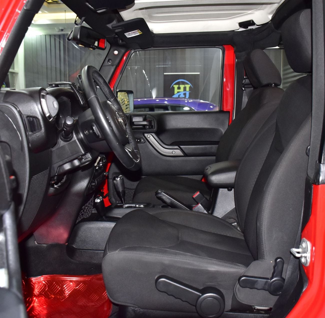 Jeep Wrangler SPORT EXCELLENT DEAL for our Jeep Wrangler Sport ( 2017 Model ) in Red Color GCC Specs