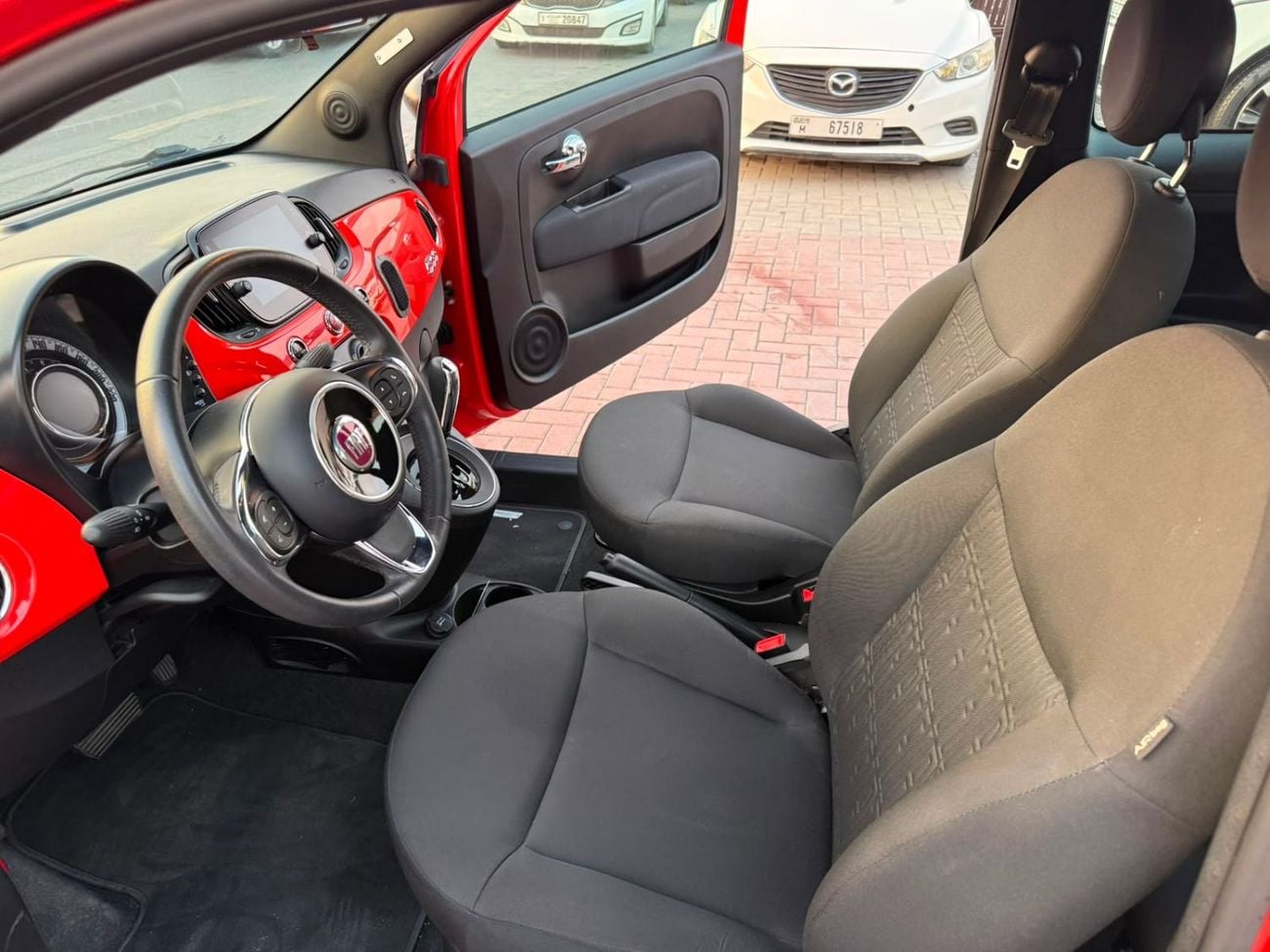 Fiat 500 DOLCEVITA A small, stylish, and economical car
