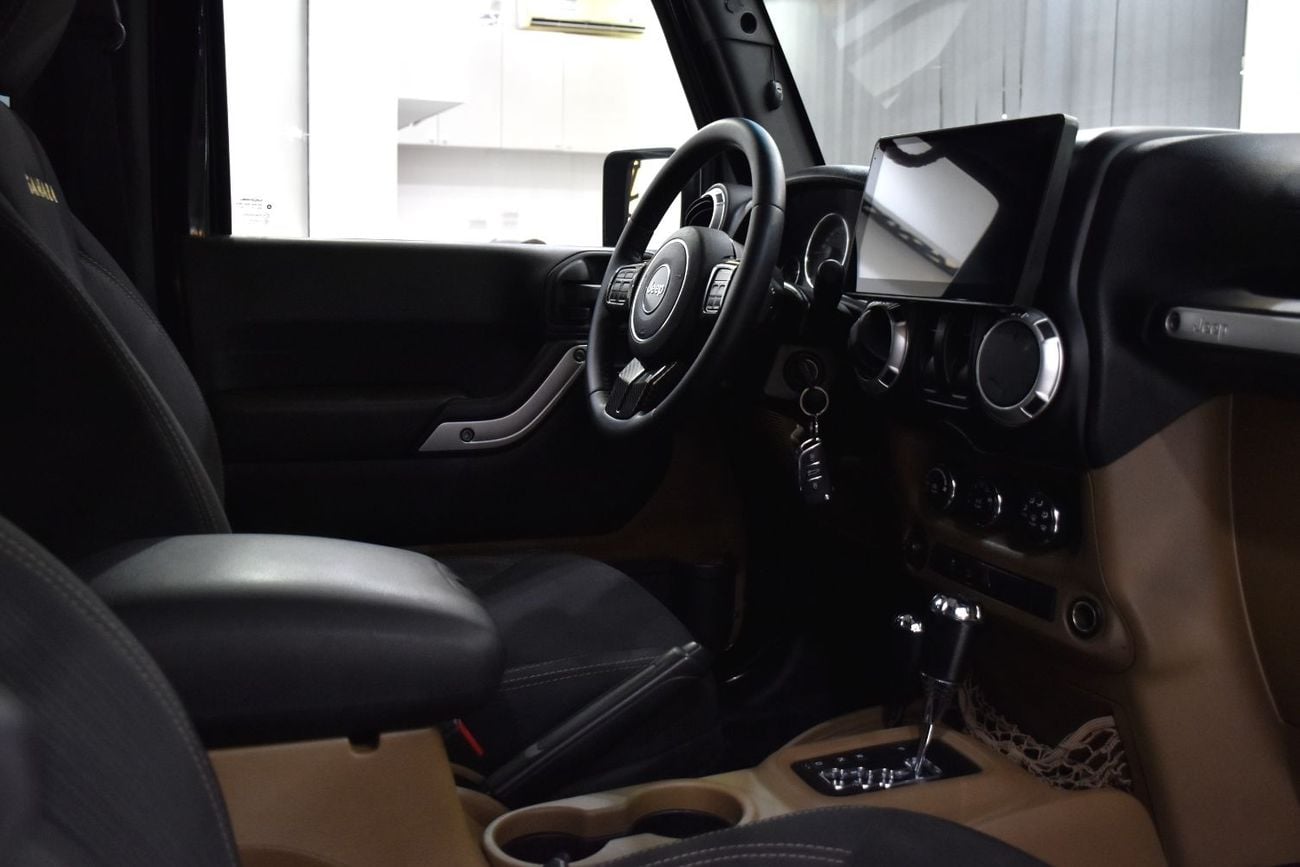 Jeep Wrangler SAHARA EXCELLENT DEAL for our Jeep Wrangler Sahara ( 2015 Model ) in Black Color GCC Specs