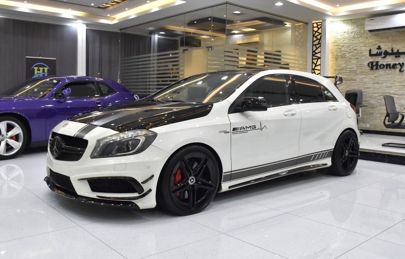 مرسيدس بنز A45 إيه إم جي عرض ممتاز لسيارة مرسيدس بنز A45 AMG 4Matic Edition 1 (موديل 2014) باللون الأبيض بمواصفات خليجية
