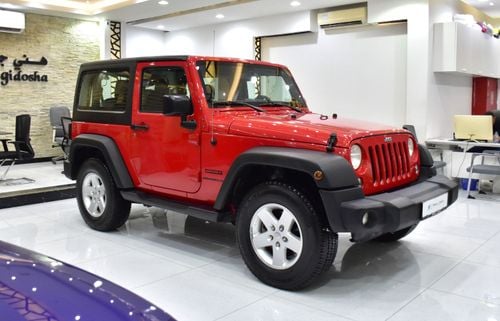 Jeep Wrangler SPORT EXCELLENT DEAL for our Jeep Wrangler Sport ( 2017 Model ) in Red Color GCC Specs