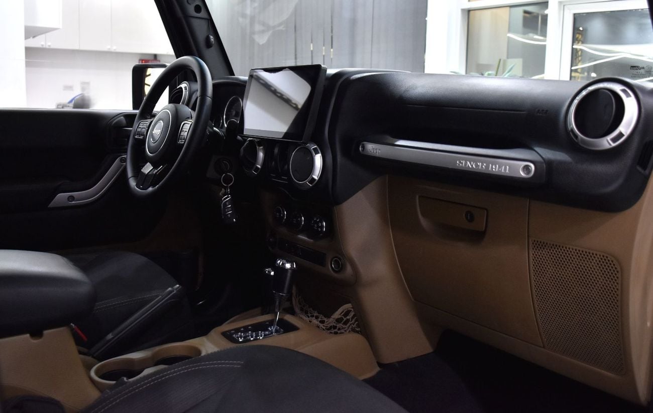 Jeep Wrangler SAHARA EXCELLENT DEAL for our Jeep Wrangler Sahara ( 2015 Model ) in Black Color GCC Specs