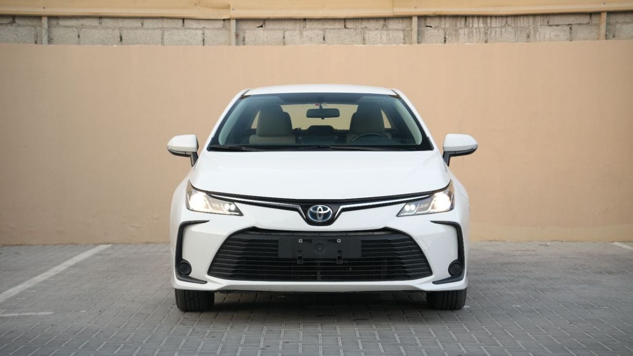 تويوتا كورولا إكس إل آي إتش إي في 1.8 لتر | ضمان الوكالة | سجل صيانة كامل | بدون دفعة أولى