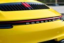 Porsche 911 CARRERA Cabriolet | Racing Yellow / Brown Roof | 379 HP | 989 KM | Warranty