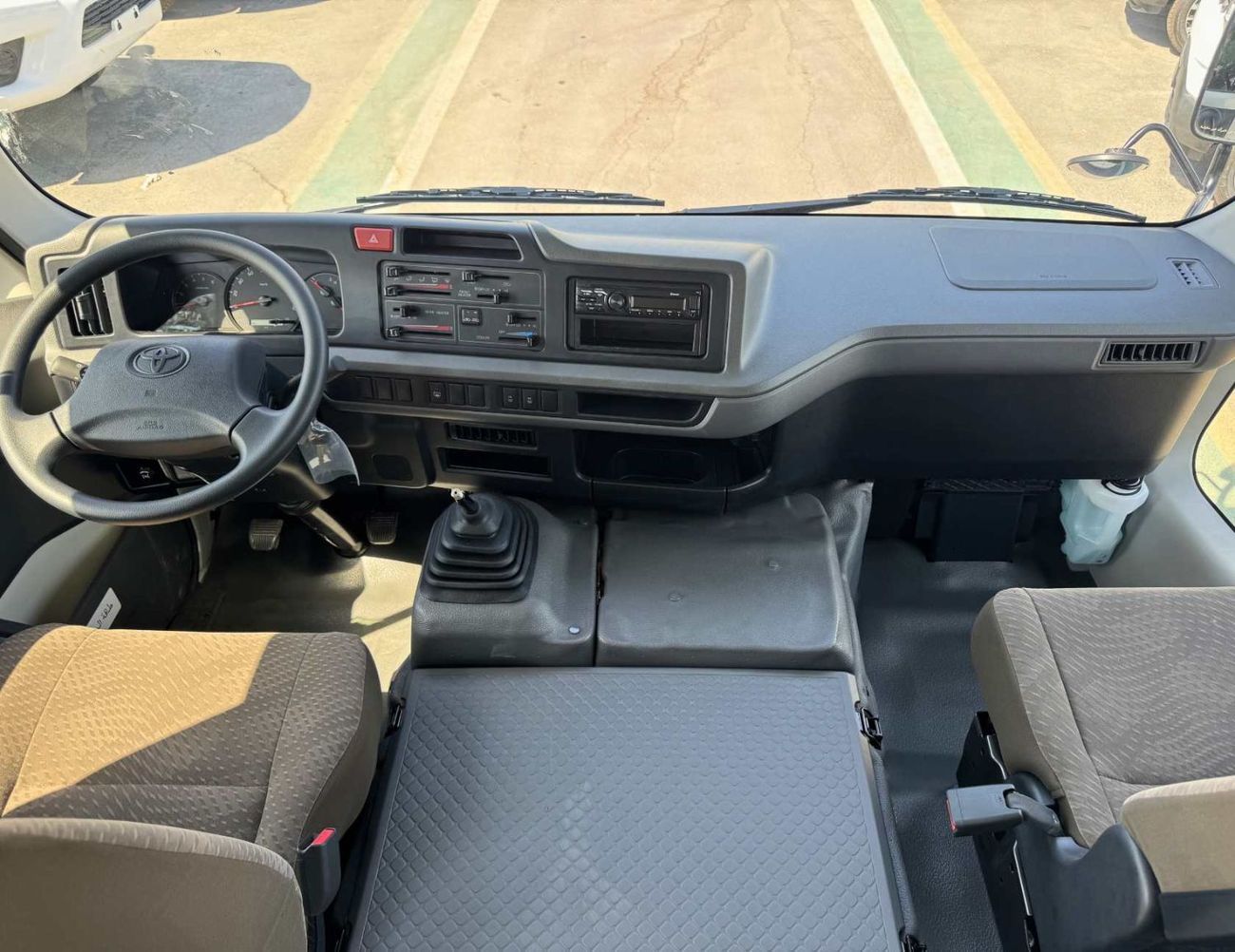 تويوتا كوستر 4.2L V6 Diesel Manual 23 Seater 4.2L V6 DIESEL || 23 STR M/T | AUTO FOLDING DOOR | REAR SEATS BELT (CODE # COD42A)