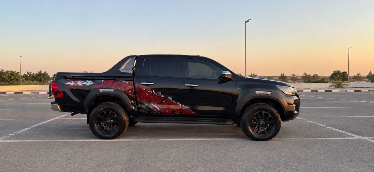 Toyota Hilux GL 2021Model Adventure Modified 2.7L v4 petrol Engine Colour Black push start Transmission Automatic In