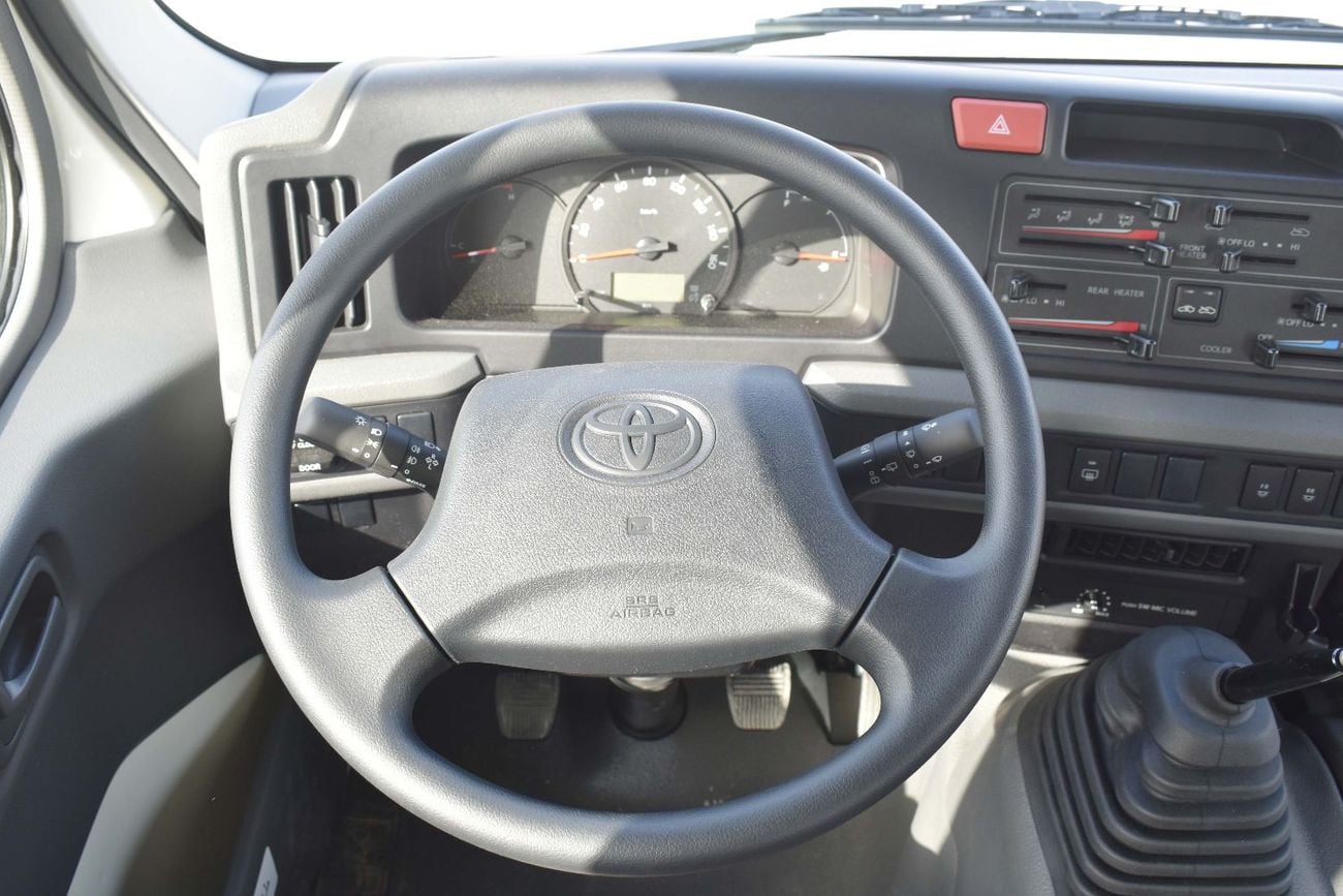 Toyota Coaster 2.7L Petrol M/T 2026 Model (With Baggage Rack and Curtain Rail)