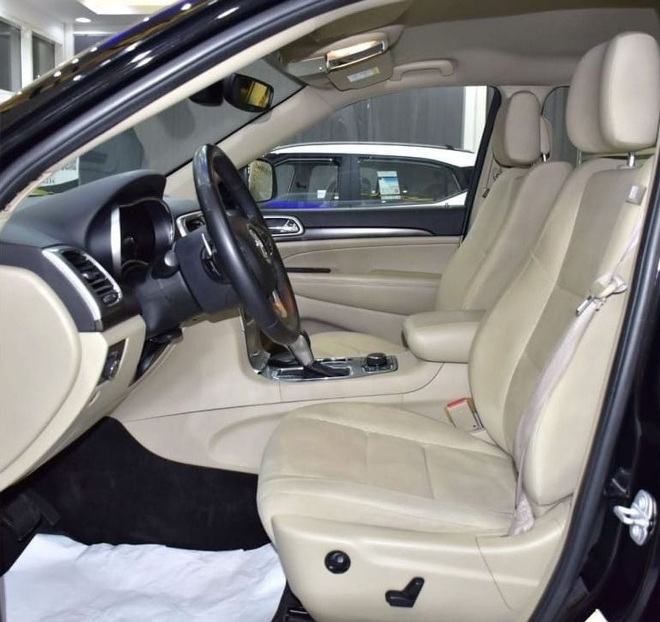 Jeep Grand Cherokee LAREDO EXCELLENT DEAL for our Jeep Grand Cherokee 4x4 (2018 Model) in Black Color GCC Specs