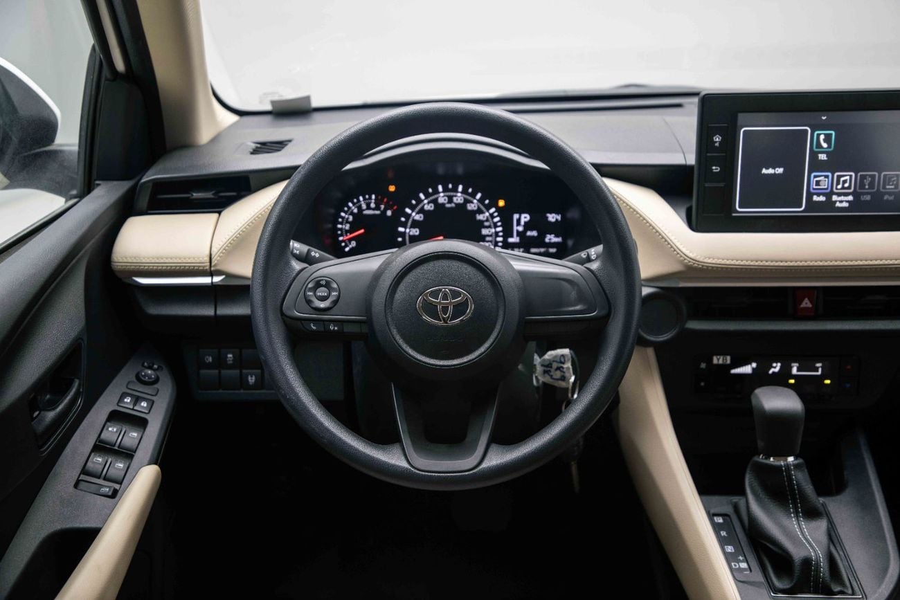 Toyota Yaris E 1.5L - Super White Inside Beige | Export Only
