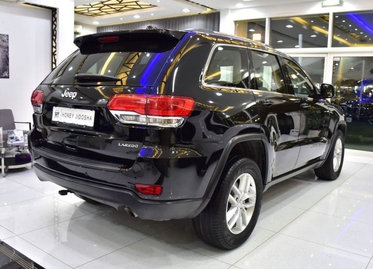 Jeep Grand Cherokee LAREDO EXCELLENT DEAL for our Jeep Grand Cherokee 4x4 (2018 Model) in Black Color GCC Specs