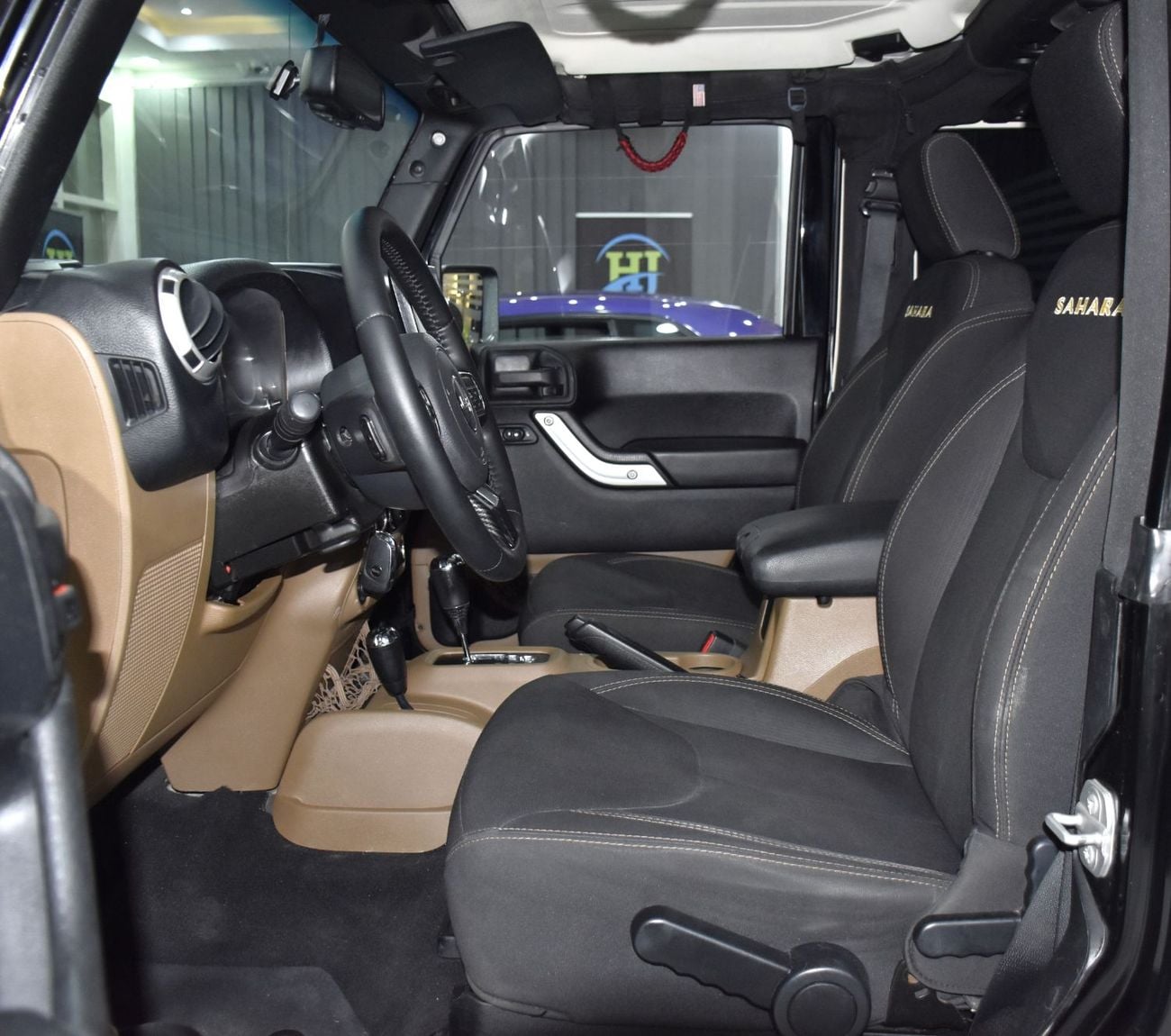 Jeep Wrangler SAHARA EXCELLENT DEAL for our Jeep Wrangler Sahara ( 2015 Model ) in Black Color GCC Specs