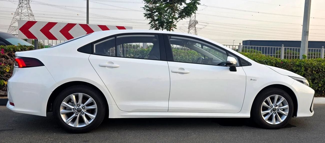 تويوتا كورولا XLI EXECUTIVE HEV 1.8 Hybrid - Brand full option