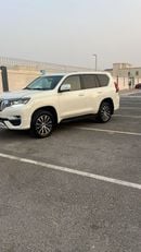 تويوتا برادو VXR محرك بنزين V6 سعة 4.0 لتر، كامل المواصفات، لون أبيض، زر تشغيل، فتحة سقف، ناقل حركة أوتوماتيكي، مقاعد