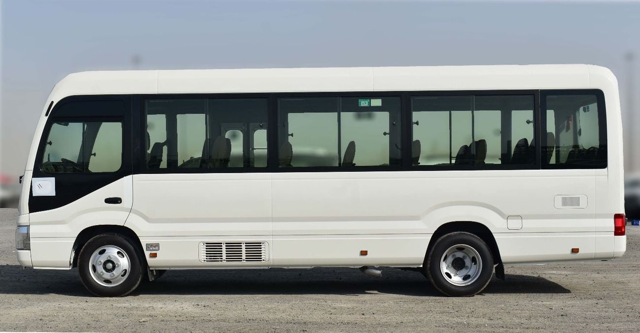 Toyota Coaster 2.7L Petrol M/T 2026 Model (With Baggage Rack and Curtain Rail)