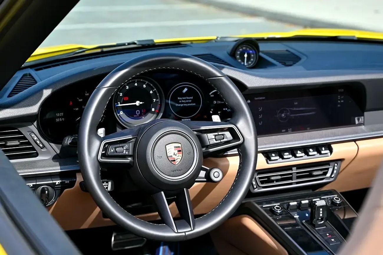 Porsche 911 CARRERA Cabriolet | Racing Yellow / Brown Roof | 379 HP | 989 KM | Warranty