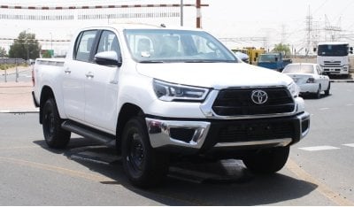Toyota Hilux 2.4L diesel  . White 2024 model, M/T Wide body with Chrome bumper