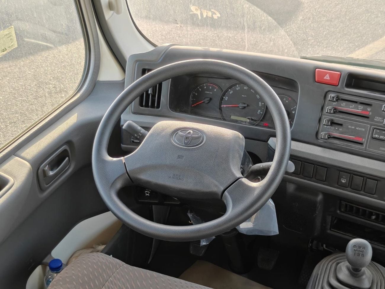 تويوتا كوستر 4.2L V6 DIESEL | 23 STR | M/T | AUTO DOOR | LUGGAGE RACK| MY2026