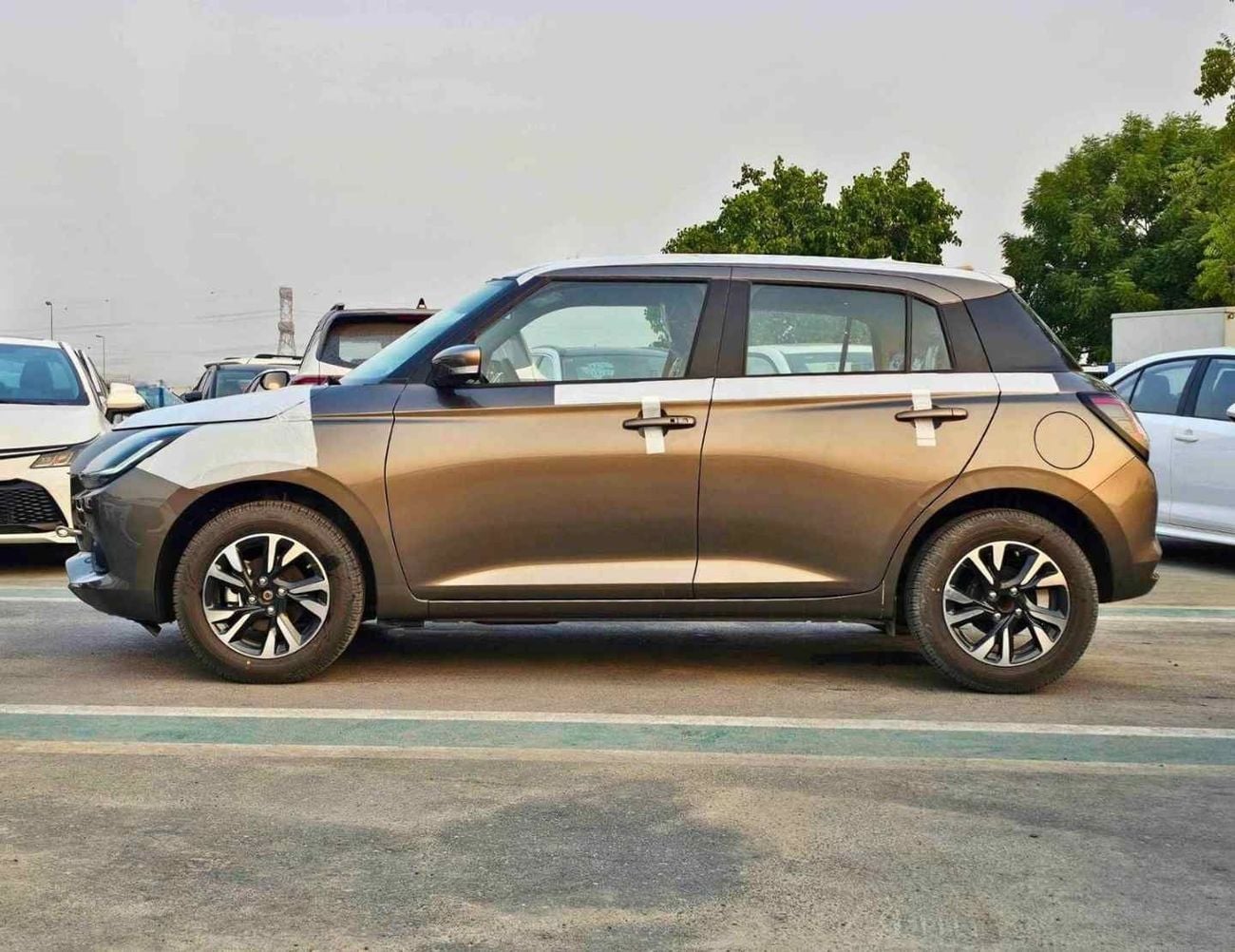 Suzuki Swift GLX SUZUKI SWIFT GLX HYBRID || RADAR | PETROL AT 1.2L V4 (CODE # SWGLXFOH) GRAY 2026