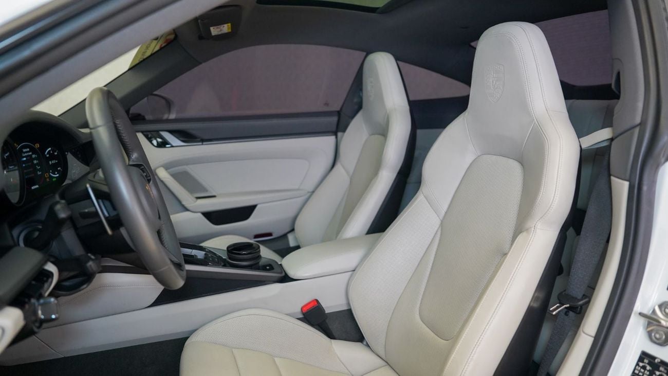 بورش 911 CARRERA 4S بورش 911 كاريرا 4S موديل 2020 | مواصفات خليجية | بحالة ممتازة | ضمان بورش حتى مارس 2027