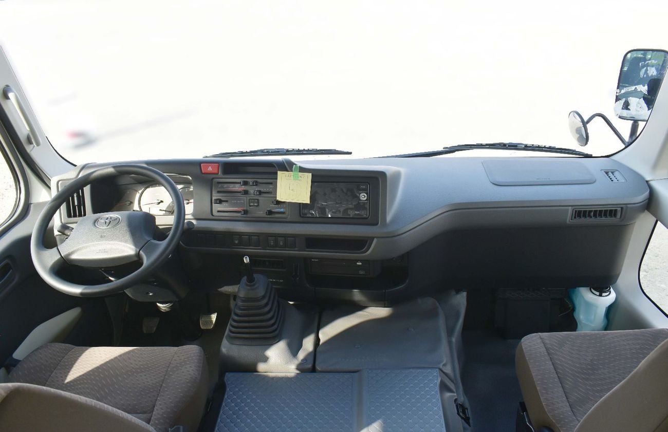 Toyota Coaster 2.7L Petrol M/T 2026 Model (With Baggage Rack and Curtain Rail)