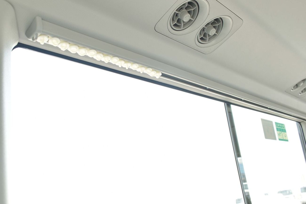 Toyota Coaster 2.7L Petrol M/T 2026 Model (With Baggage Rack and Curtain Rail)