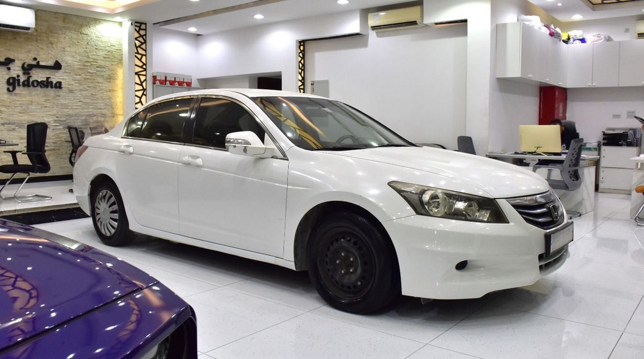 Honda Accord EXCELLENT DEAL for our Honda Accord i-Vtec ( 2012 Model ) in White Color GCC Specs