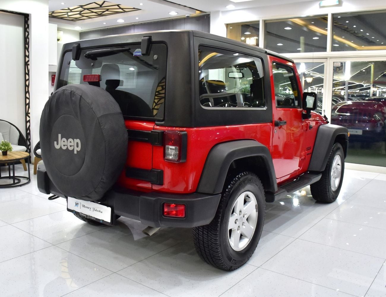 Jeep Wrangler SPORT EXCELLENT DEAL for our Jeep Wrangler Sport ( 2017 Model ) in Red Color GCC Specs
