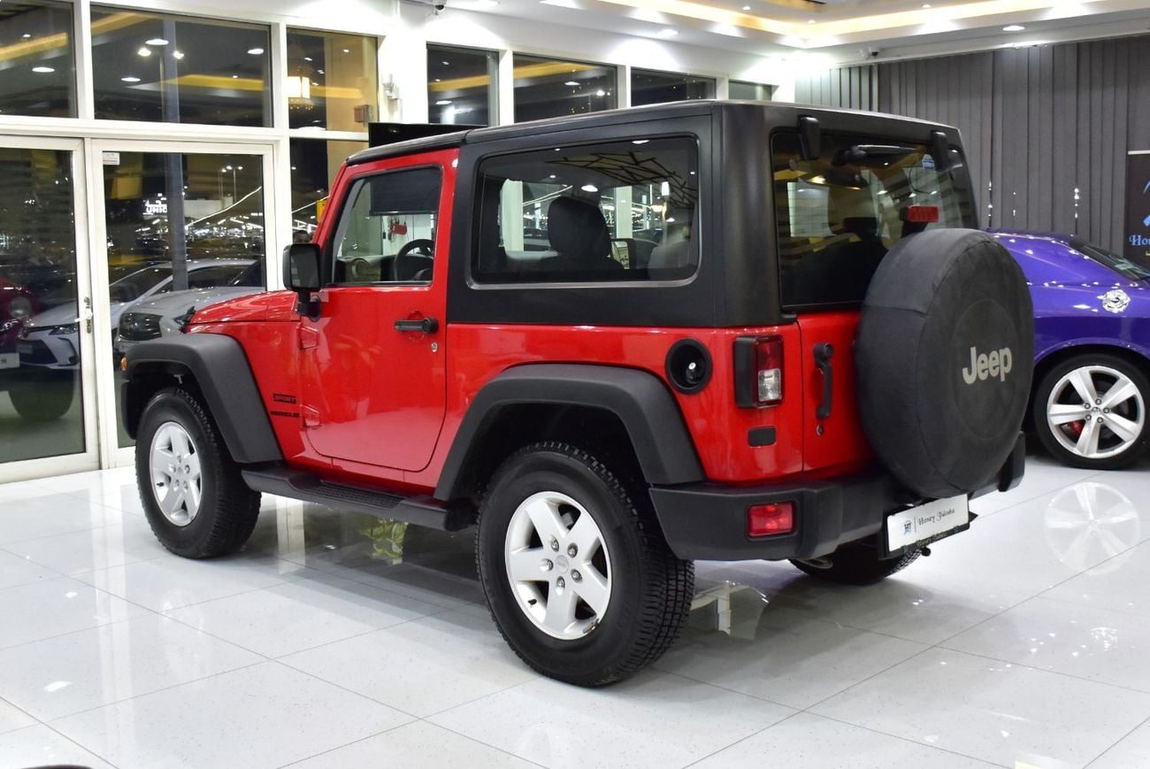 Jeep Wrangler SPORT EXCELLENT DEAL for our Jeep Wrangler Sport ( 2017 Model ) in Red Color GCC Specs