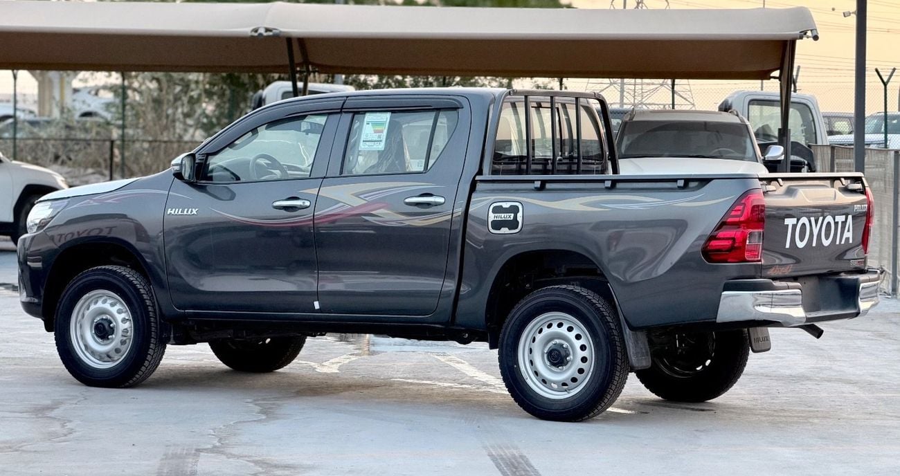 Toyota Hilux DLX 2026 Toyota Hilux 2.4L Diesel 4WD Double Cab Pickup, equipped with a manual transmission. Powered by