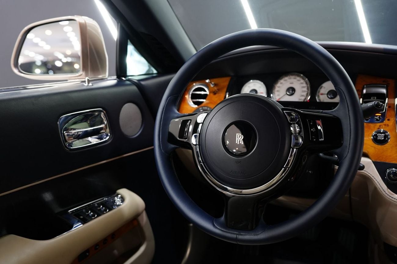 Rolls Royce Wraith STD (6.6L · 12 Cyl · Automatic · Petrol · Coupe · Rear Wheel Drive · 4 Seats · 2 Door) Two-Tone, Starlight Headliner, GCC Specs!!