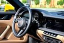 Porsche 911 CARRERA Cabriolet | Racing Yellow / Brown Roof | 379 HP | 989 KM | Warranty