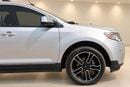 فورد إدج SEL فورد إيدج SEL موديل 2014، بمحرك V6 سعة 3.5 لتر ونظام دفع رباعي، لون فضي مع عجلات ألمنيوم سوداء وفضية