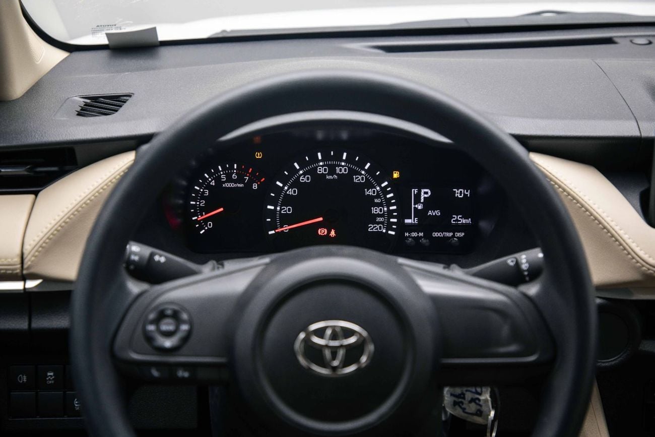Toyota Yaris E 1.5L - Super White Inside Beige | Export Only