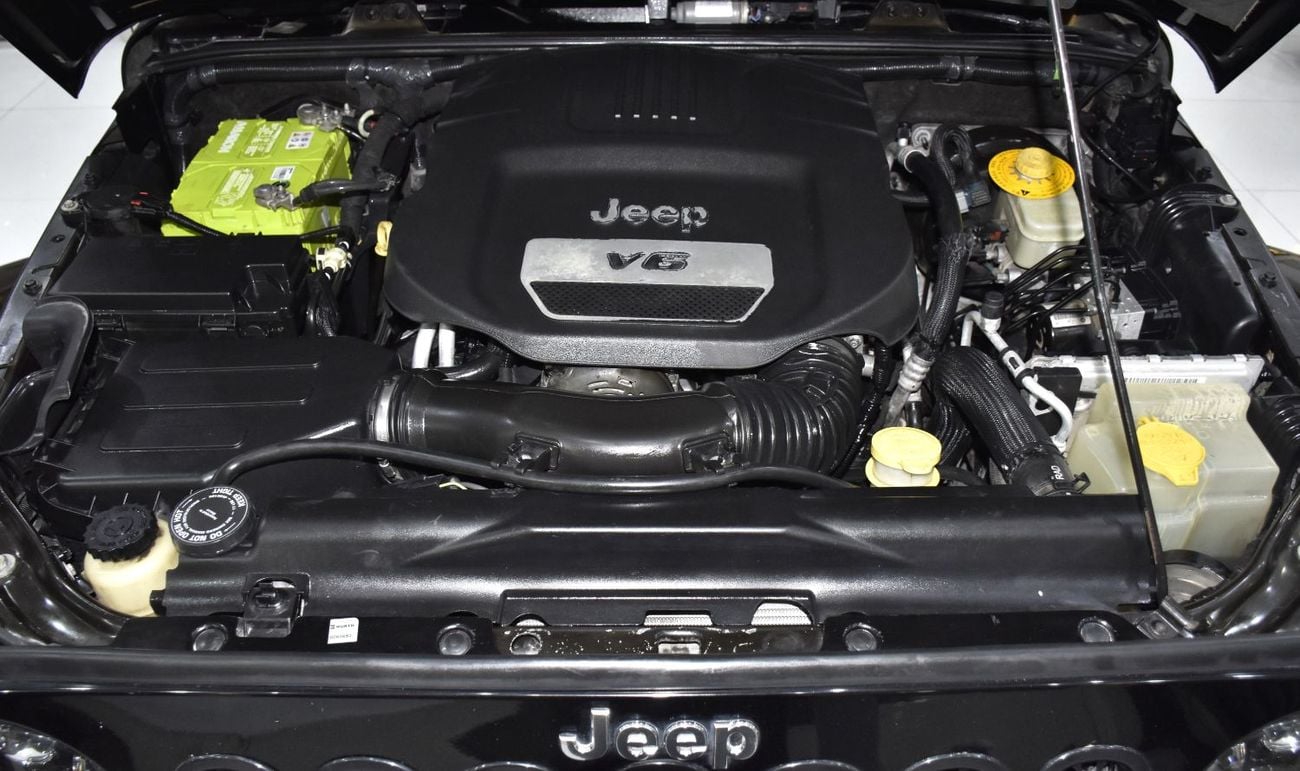 Jeep Wrangler SAHARA EXCELLENT DEAL for our Jeep Wrangler Sahara ( 2015 Model ) in Black Color GCC Specs