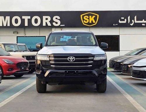 Toyota Land Cruiser GXR GX E1 TWIN TURBO || 3.3L DIESEL A/T / FABRIC SEATS / BIG DVD (CODE # GX E1)