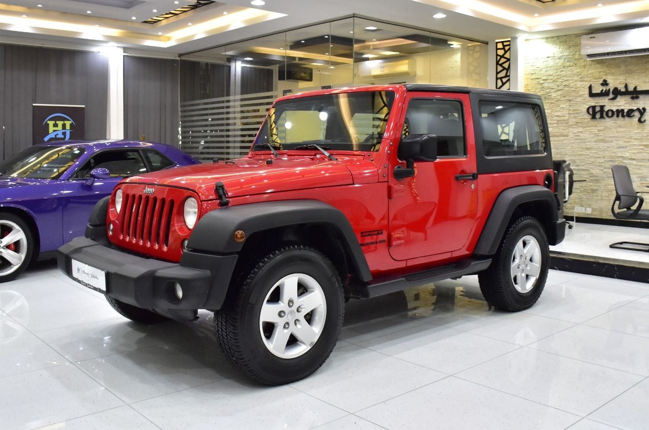 Jeep Wrangler SPORT EXCELLENT DEAL for our Jeep Wrangler Sport ( 2017 Model ) in Red Color GCC Specs