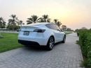 Tesla Model Y LONG RANGE - American Specs ADNOC PASS Cetficate