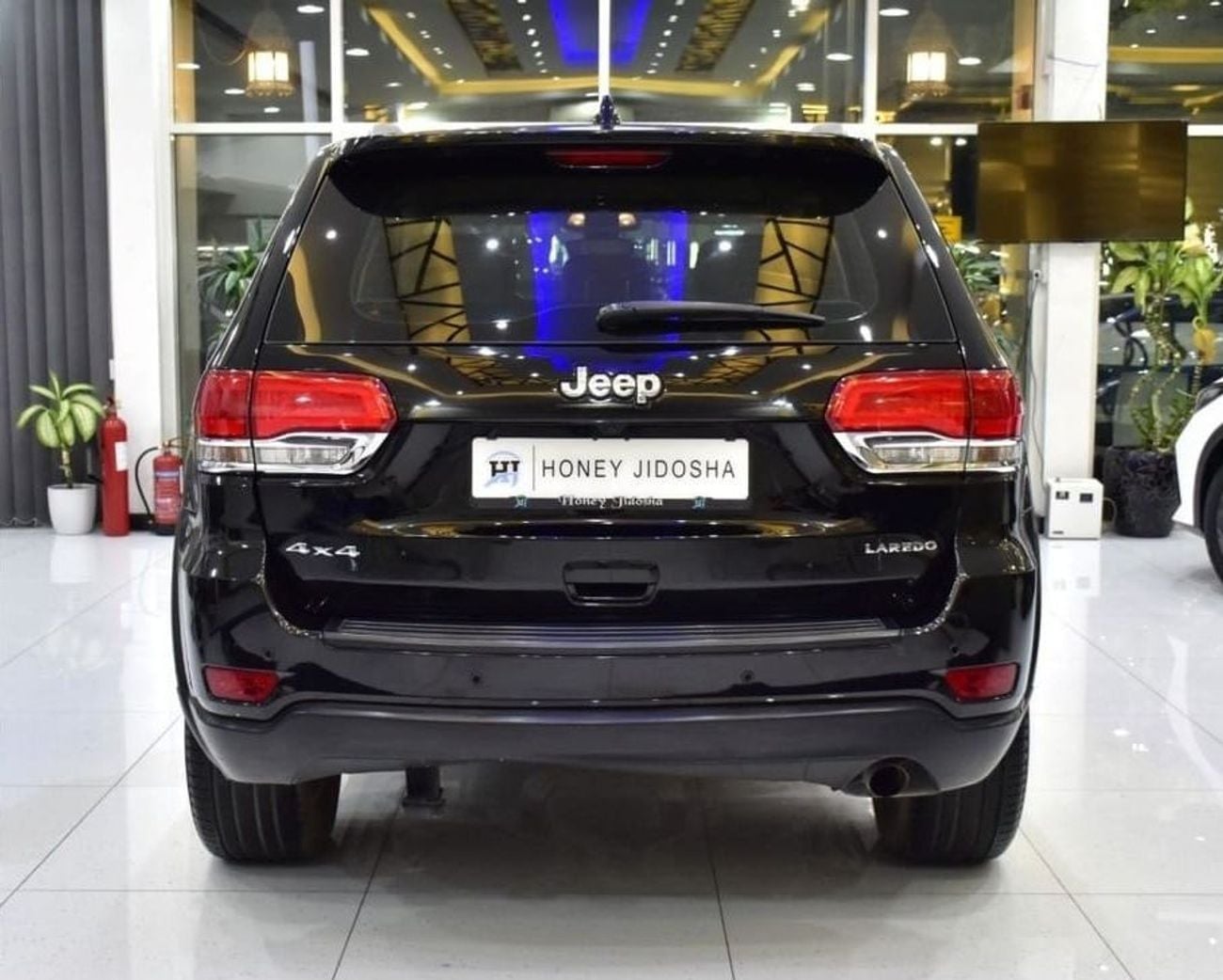 Jeep Grand Cherokee LAREDO EXCELLENT DEAL for our Jeep Grand Cherokee 4x4 (2018 Model) in Black Color GCC Specs