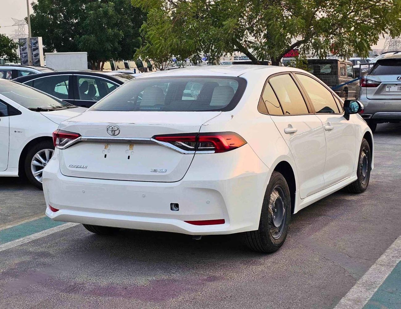 تويوتا كورولا XLI E / 1.6L V4 PETROL / DVD / REAR PARKING SENSOR (CODE # XLI E)